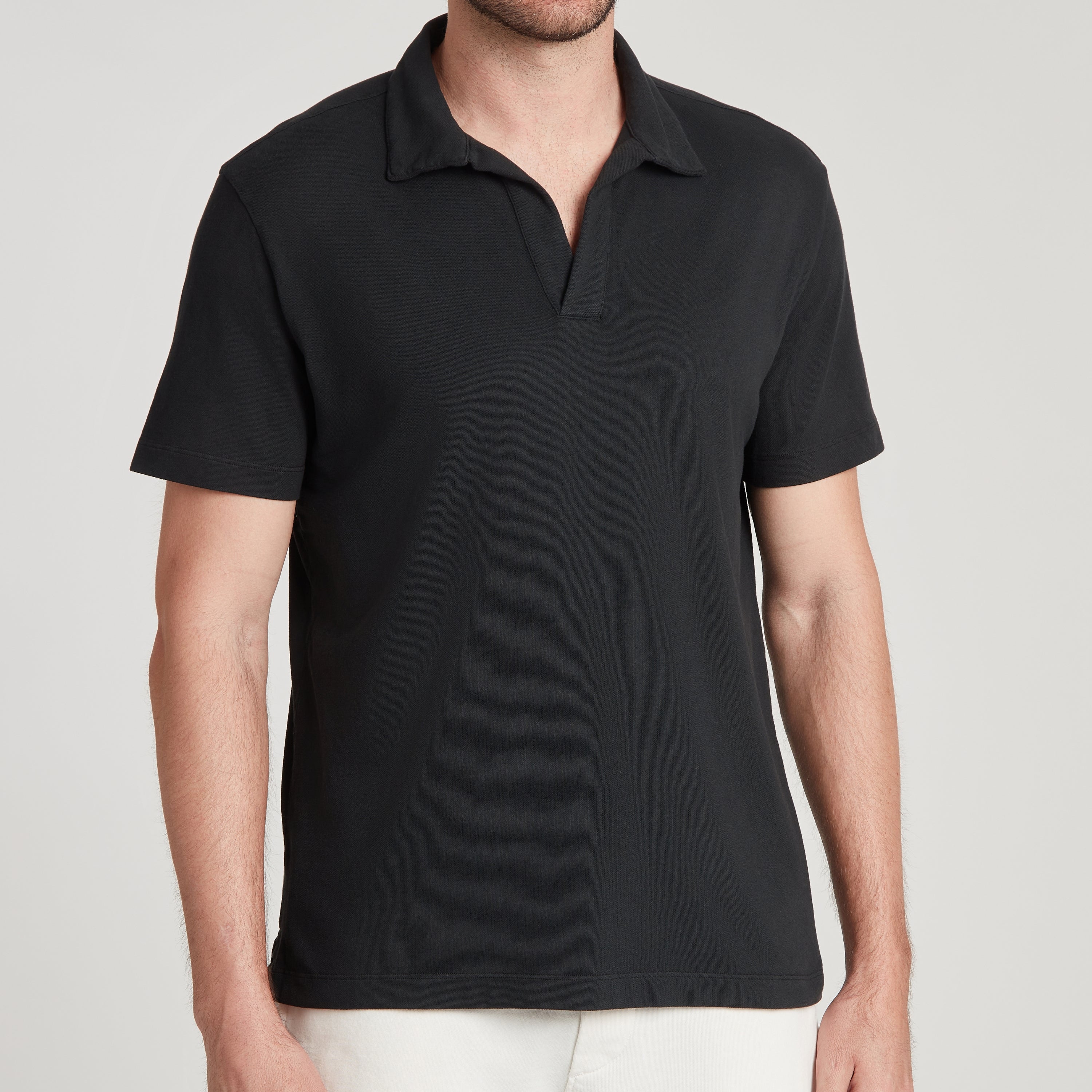 Polo uomo nera in micro piquet tinta in capo, design veneziano e comfort premium