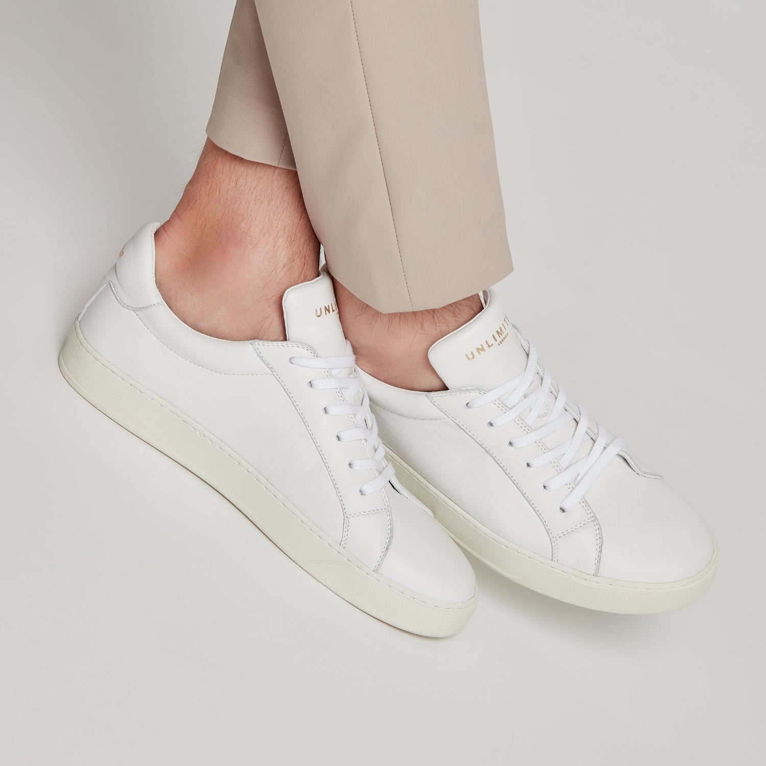 SNEAKERS ARTIGIANALI IN VITELLO NAPPATO “BIANCA” – UNLIMITED