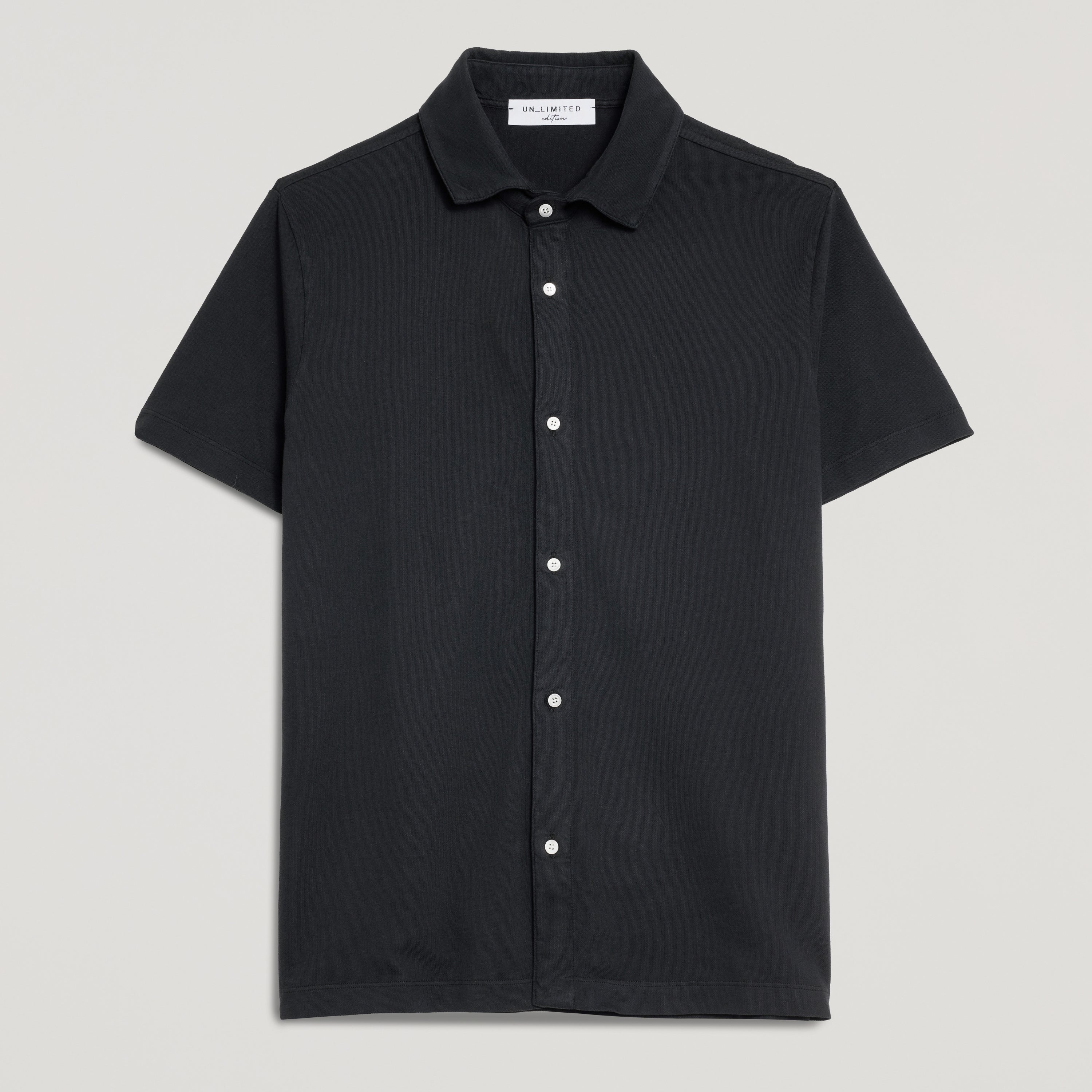 Camicia polo nera uomo in micro piquet, manica corta, bottoni bianchi, design veneziano e manifattura italiana