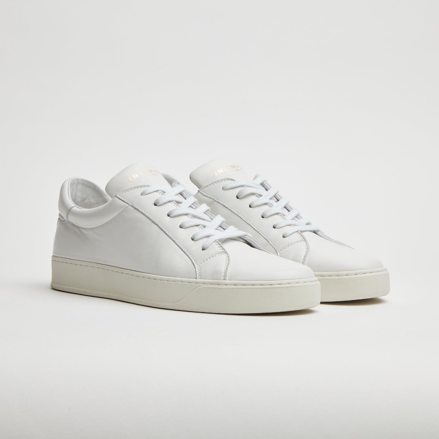 SNEAKERS ARTIGIANALI IN VITELLO NAPPATO “BIANCA” – UNLIMITED