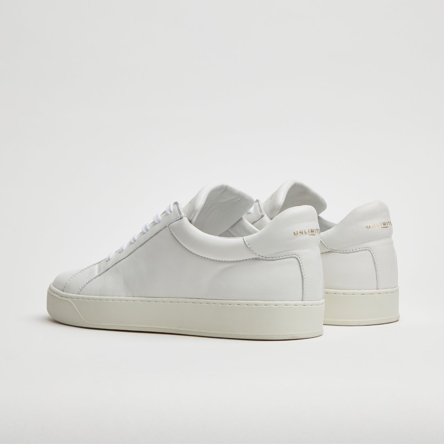 SNEAKERS ARTIGIANALI IN VITELLO NAPPATO “BIANCA” – UNLIMITED